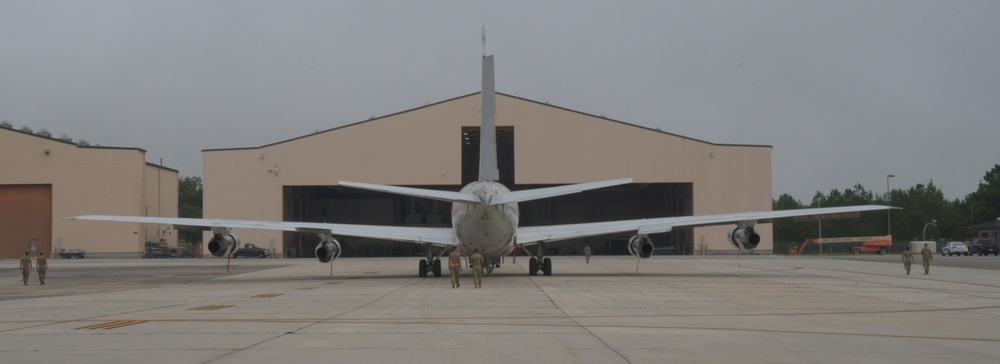 Photo of E-8C Joint STARS Aircraft Entering Hangar