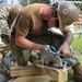 Seabees from NMCB 133 repair and reinforce a foot bridge on board Marine Corps Air Station Cherry Point, NC.