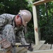 Seabees from NMCB 133 reinforce and repair a foot bridge on board Marine Corps Air Station Cherry Point, NC.