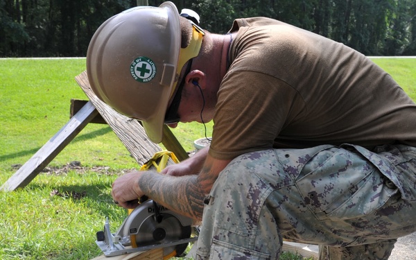 Seabees from Naval Mobile Construction Battalion (NMCB) 133 reinforce and repair a damaged foot bridge on board Marine Corps Air Station Marine Corps Air Station Cherry Point, NC.