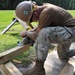 Seabees from Naval Mobile Construction Battalion (NMCB) 133 reinforce and repair a damaged foot bridge on board Marine Corps Air Station Marine Corps Air Station Cherry Point, NC.