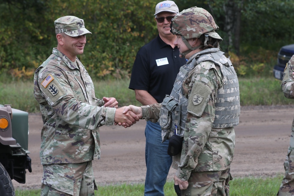 North Dakota National Guard Senior Enlisted Leader Presents Coin of Excellence to ND Soldier