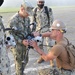 Seabees from NMCB 133 survey damage to begin their airfield damage repair evolution during LSE 2021