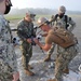 Seabees from NMCB 133 assemble a drone which will be used to survey runway damage.