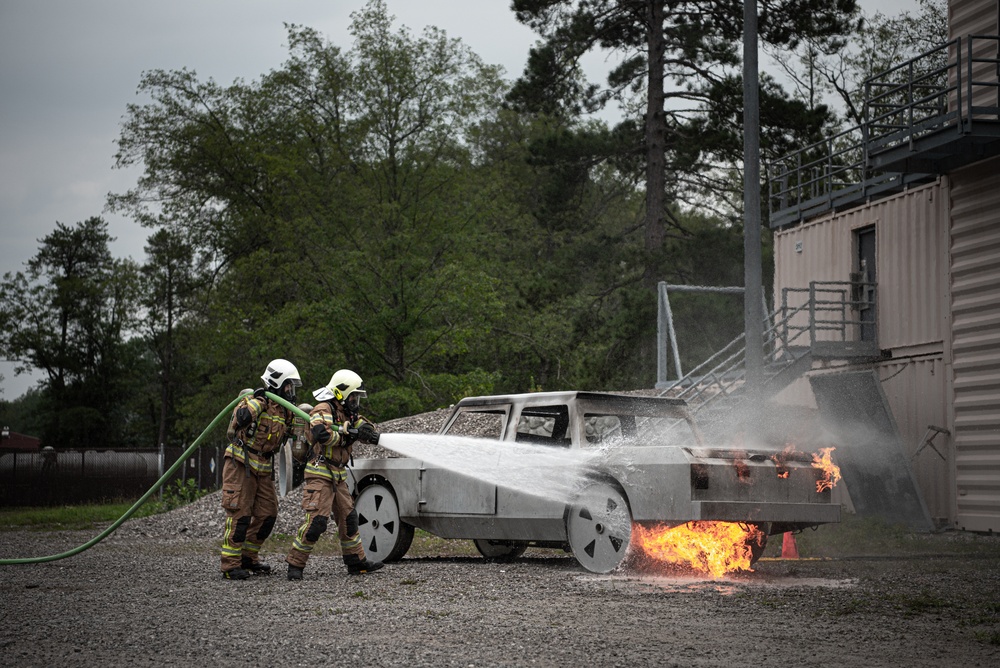 State partner firefighters receive training on car fires