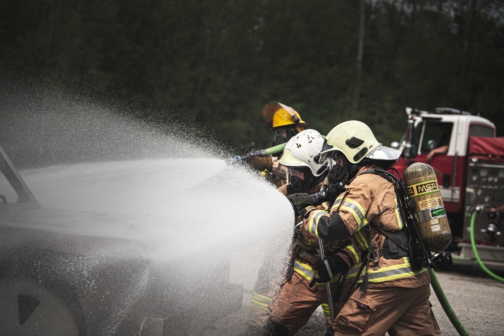 State partner firefighters receive training on car fires