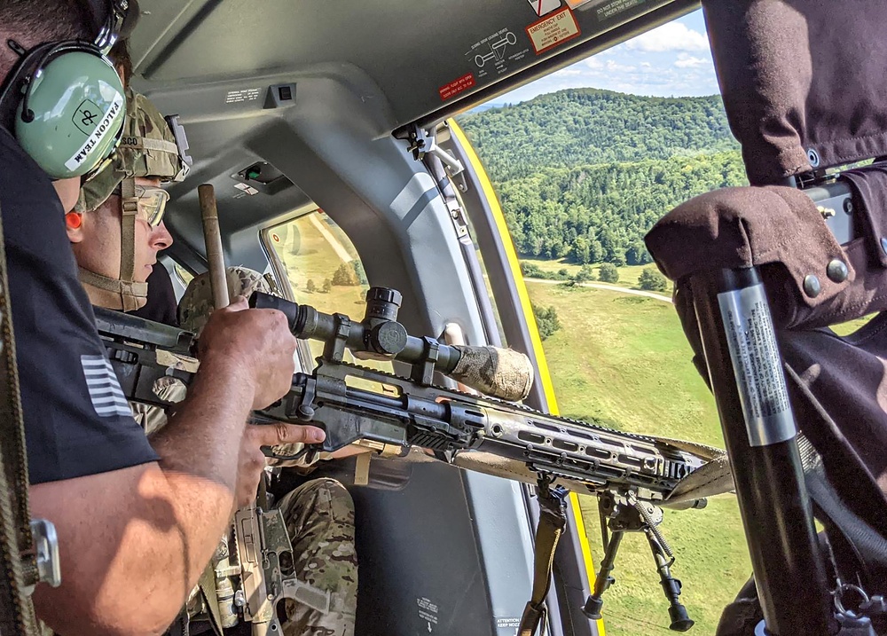 Sniper in helicopter