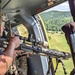 Sniper in helicopter