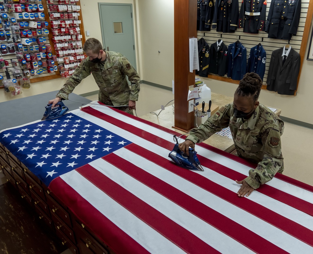 U.S. Flag preparation at Air Force Mortuary Affairs Operations