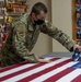 U.S. Flag preparation at Air Force Mortuary Affairs Operations