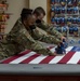 U.S. Flag preparation at Air Force Mortuary Affairs Operations