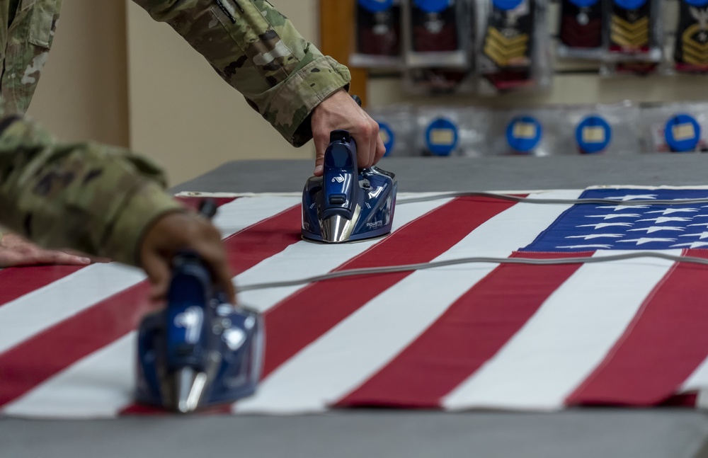 U.S. Flag preparation at Air Force Mortuary Affairs Operations