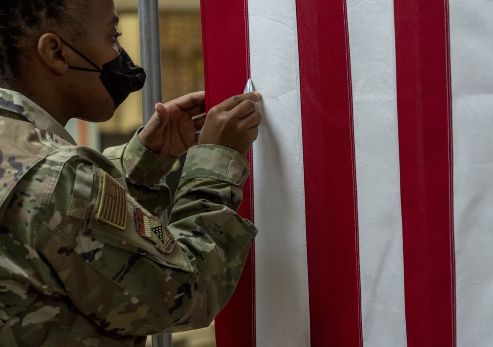 U.S. Flag preparation at Air Force Mortuary Affairs Operations