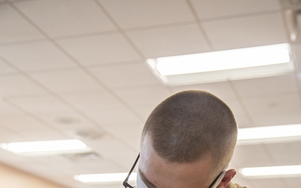 210810-N-YF306-0060 NEWPORT, R.I (Aug. 10, 2021) Office Candidate Uses Compass During Class