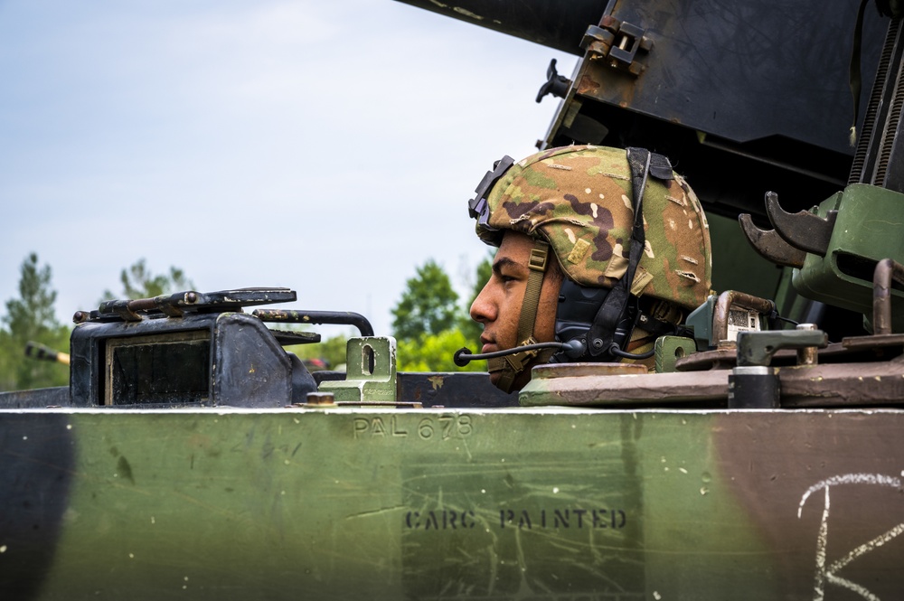 1-201st Field Artillery Regiment operates M109A6 Paladin howitzers during Northern Strike 21