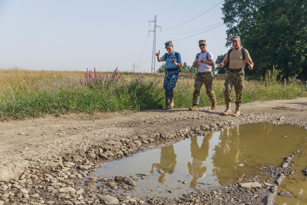 American and Romanian reserve service members participate in an orienteering training event