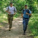 Sgt. 1st Class Shane Price runs alongside a Romanian Air Defense Reserve Soldier