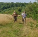 American and Romanian reserve service members participate in an orienteering training event