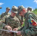 Sgt. Michael Yarrington points to a map