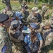 American and Romanian reserve service members practice map reading