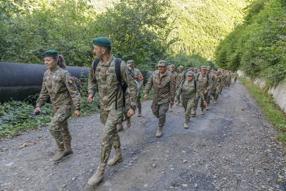 American and Romanian reserve service members participate in an orienteering training event