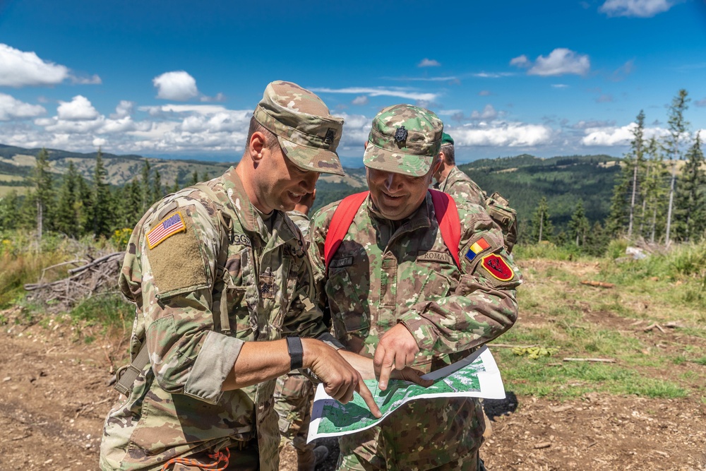 Sgt. Morgan Figgs points out a terrain feature