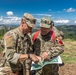 Sgt. Morgan Figgs points out a terrain feature