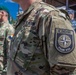 American and Romanian reserve service members stand in formation