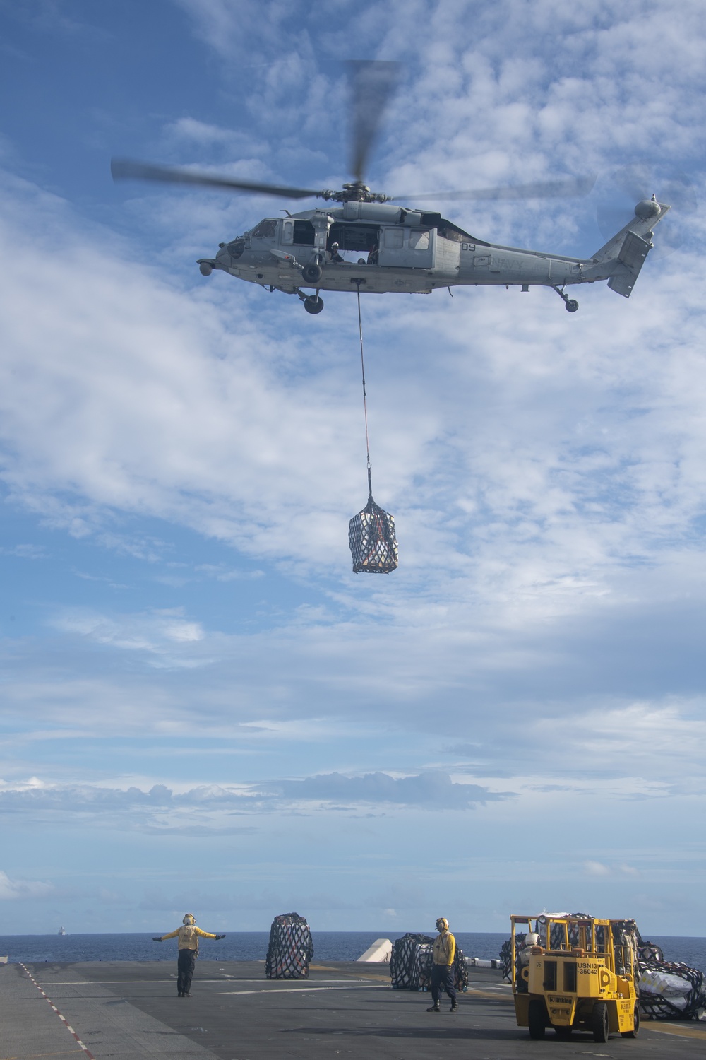 USS America conducts replenishment-at-sea with USNS Matthew Perry