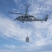 USS America conducts replenishment-at-sea with USNS Matthew Perry