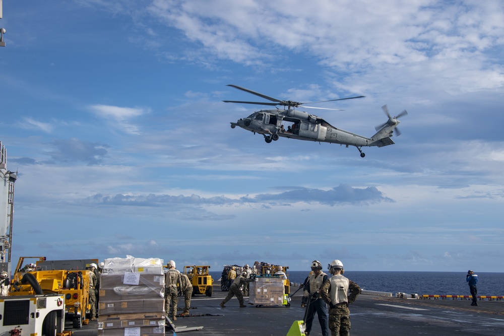 USS America conducts replenishment-at-sea with USNS Matthew Perry