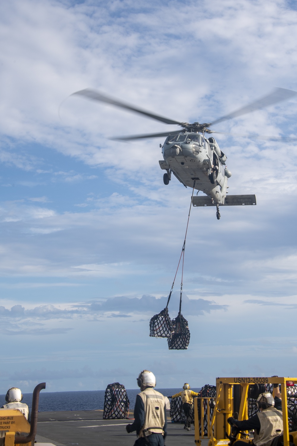 USS America conducts replenishment-at-sea with USNS Matthew Perry