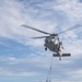 USS America conducts replenishment-at-sea with USNS Matthew Perry