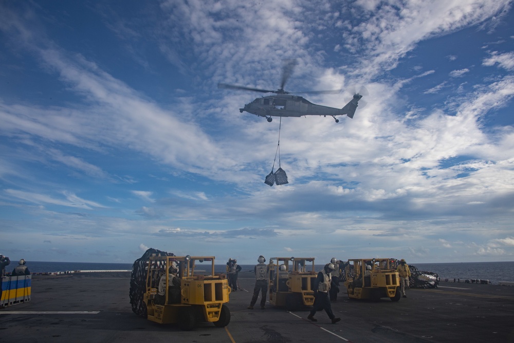 USS America conducts replenishment-at-sea with USNS Matthew Perry