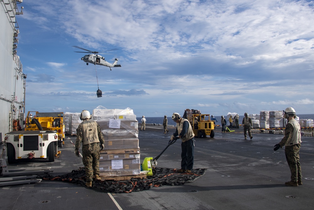 USS America conducts replenishment-at-sea with USNS Matthew Perry