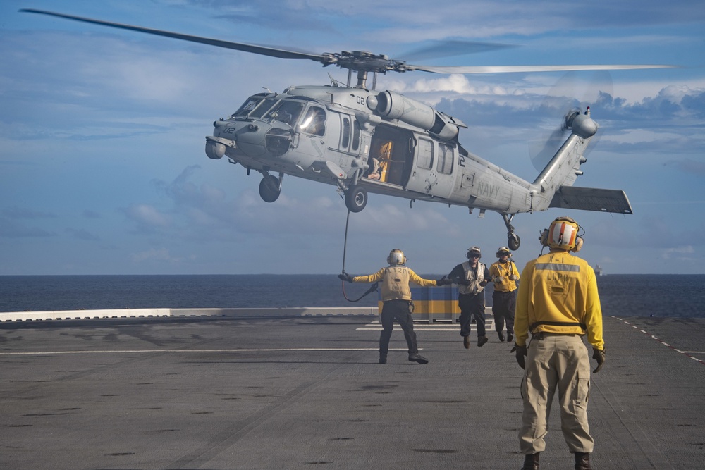 USS America conducts replenishment-at-sea with USNS Matthew Perry