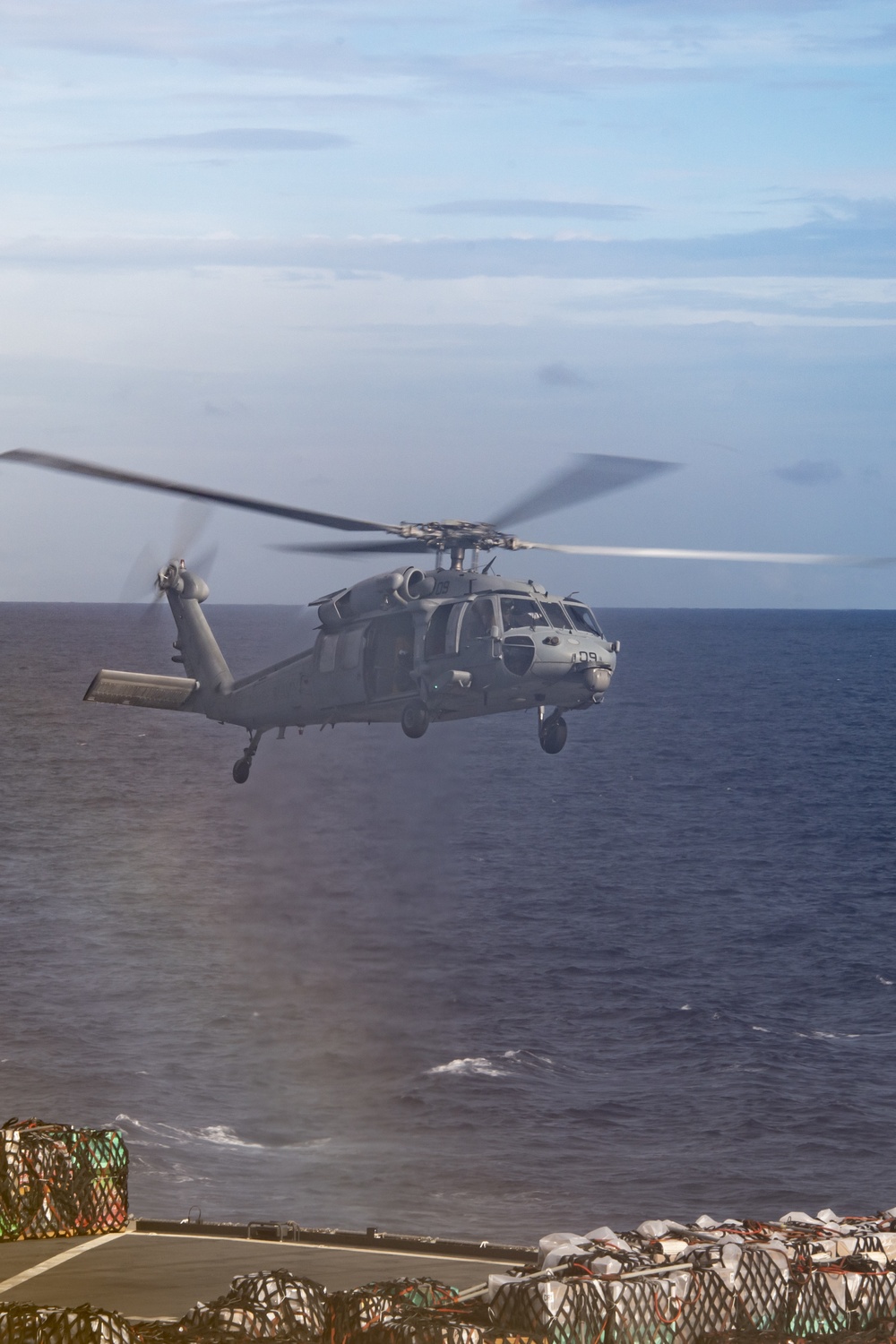 USS America conducts replenishment-at-sea with USNS Matthew Perry