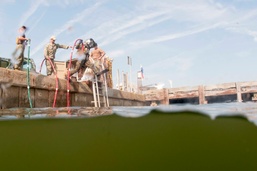 NECC Forces Conduct Port Damage Repair During LSE 2021