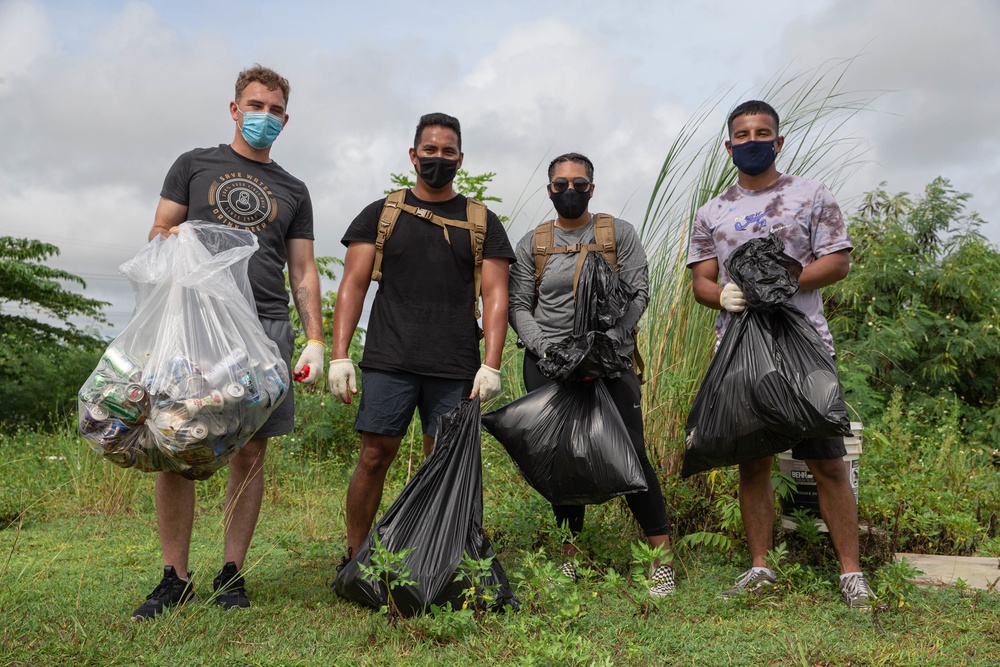 U.S. Marines volunteer within a local Guam community