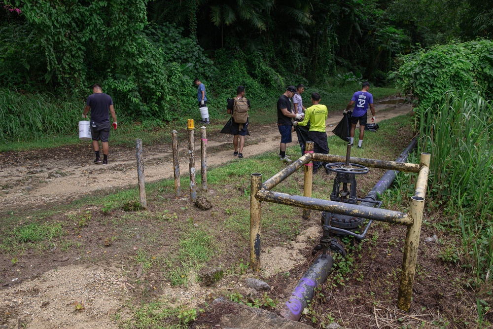 U.S. Marines volunteer within a local Guam community