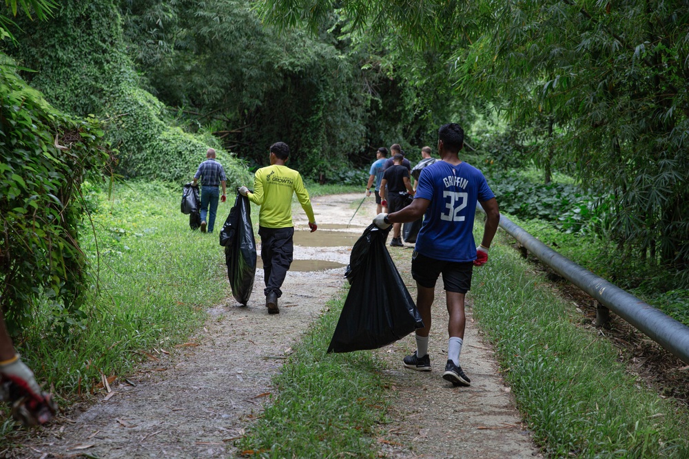 U.S. Marines volunteer within a local Guam community