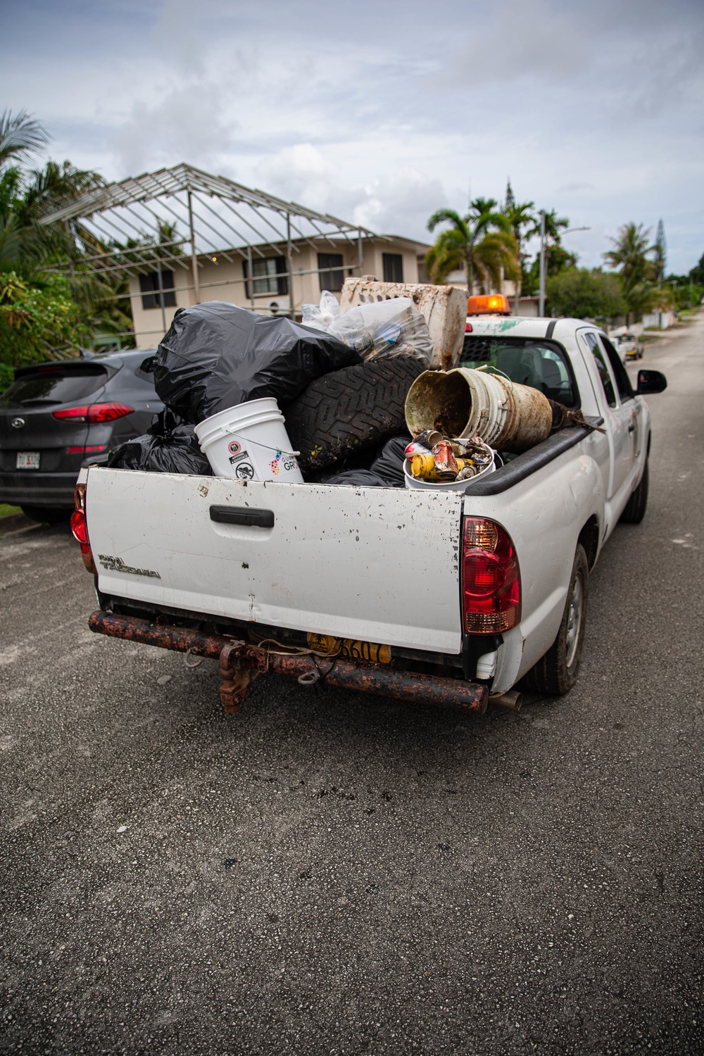 U.S. Marines volunteer within a local Guam community