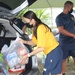 Guam Based Sailors and Visiting Marines Assist With Food Commodity Distribution