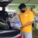 Guam Based Sailors and Visiting Marines Assist With Food Commodity Distribution