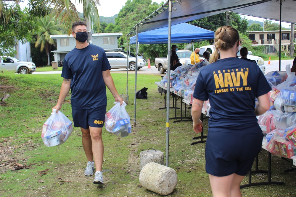 Guam Based Sailors and Visiting Marines Assist With Food Commodity Distribution