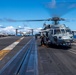 USS Carl Vinson (CVN 70) helicopter prepares to take off
