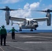 USS Carl Vinson (CVN 70) Osprey lands on flight deck