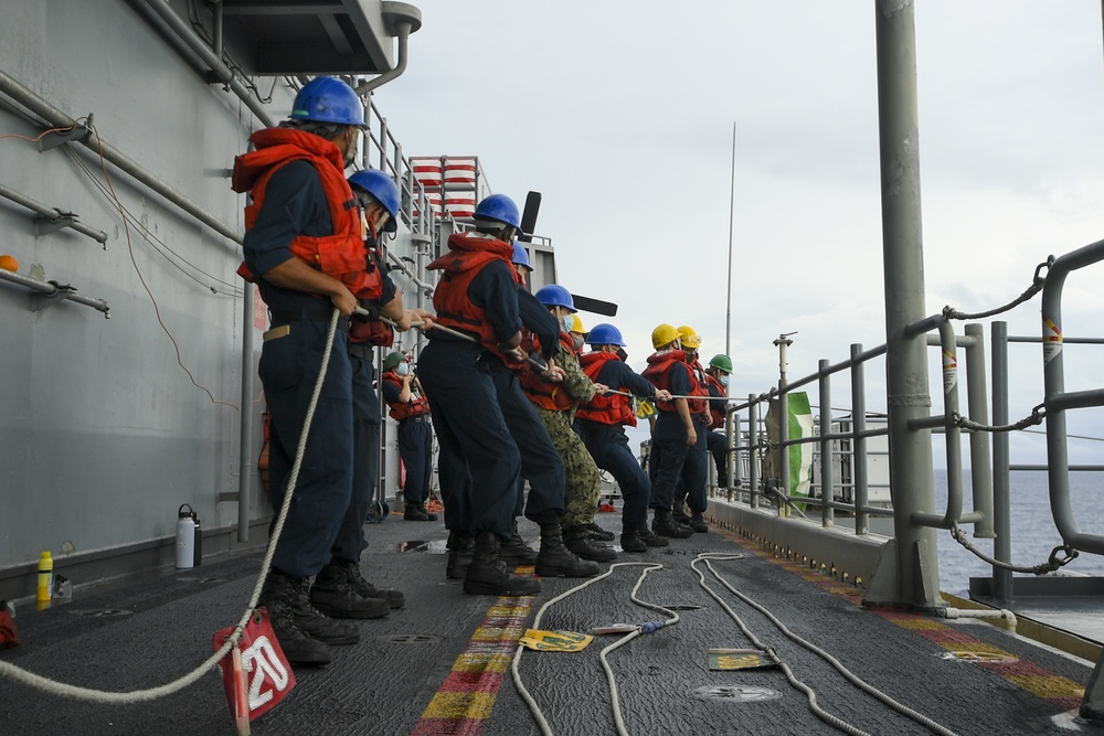 USS America conducts a replenishment-at-sea with the USNS Rappahannock