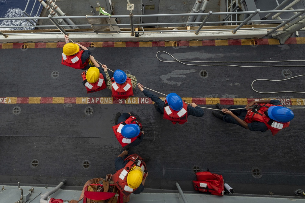 USS America conducts a replenishment-at-sea with the USNS Rappahannock