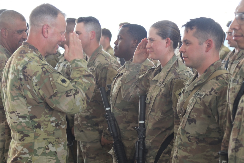 Task Force Wolfpack Soldiers receive the combat patch